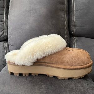 Ugg Coquette chestnut slippers.  Never been used